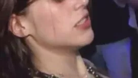 Wanita itu mengelus  ...